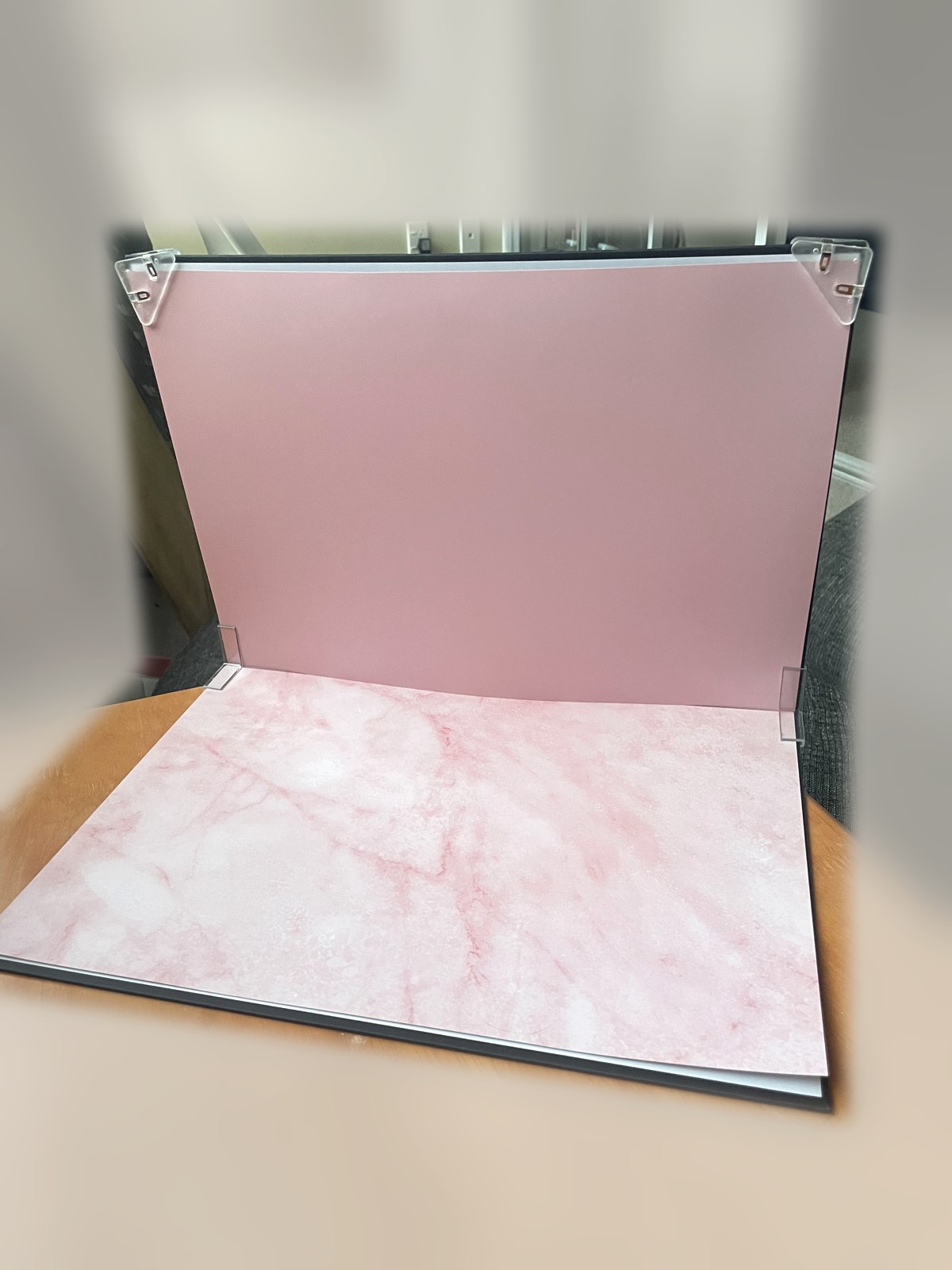 Pink marble tabletop backdrop set up in Emma's home studio
